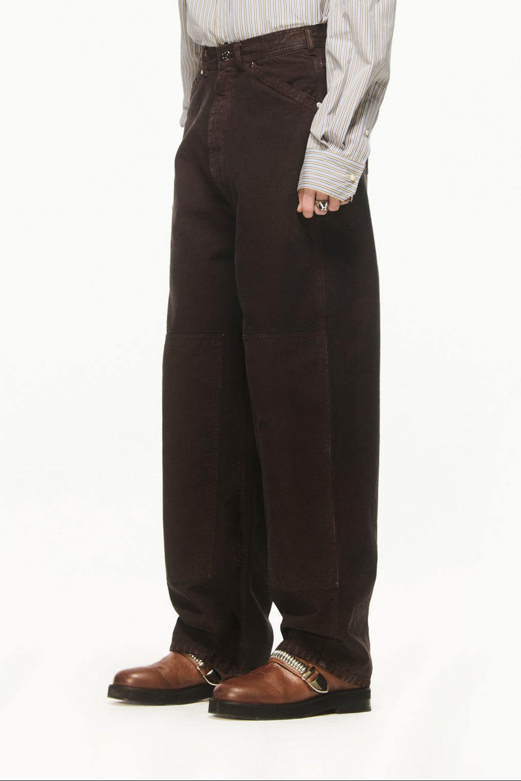 BLUEMARBLE garment-dyed brown canvas workwear pants featuring a relaxed fit, high-rise waist, knee patch panels, five-pocket construction, belt loops and zip fly closure.