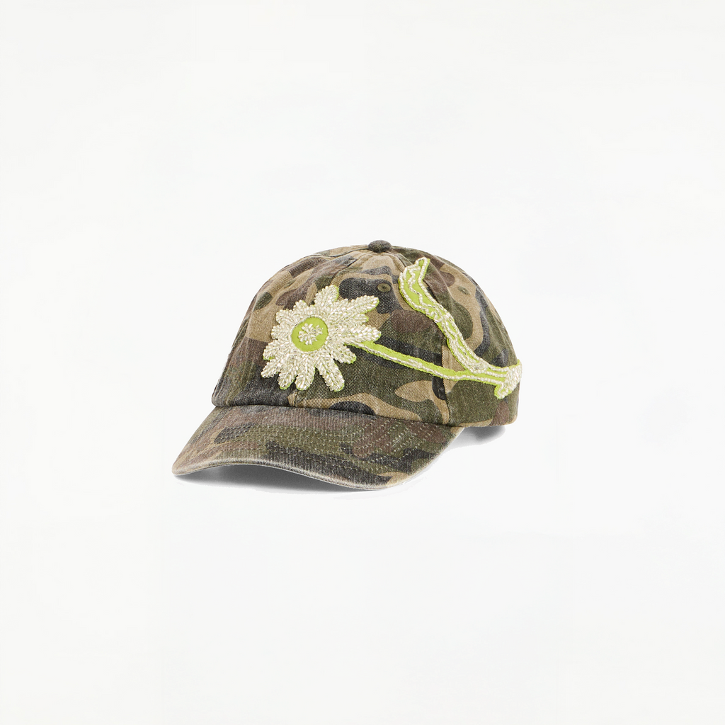 BLUEMARBLE washed cotton camouflage baseball cap featuring a hand-embroidered floral beaded leather patch on the front panel and an adjustable metal clasp at the back.