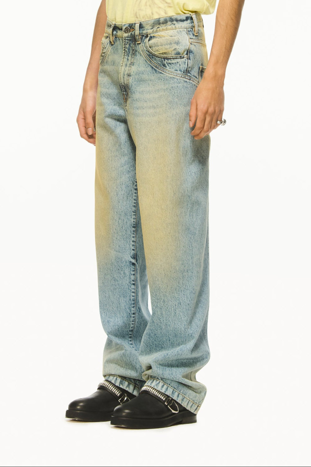 BLUEMARBLE sand-washed blue denim pants featuring a relaxed fit, curved panel detailing at the back, five-pocket construction and a leather logo patch at the back waistband.