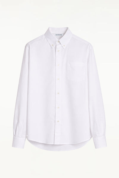 BLUEMARBLE white poplin shirt featuring molten metal studs along the shoulders and armholes, raw-edge detailing, a slightly oversized fit, chest patch pocket and button-down collar.