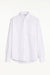BLUEMARBLE white poplin shirt featuring molten metal studs along the shoulders and armholes, raw-edge detailing, a slightly oversized fit, chest patch pocket and button-down collar.