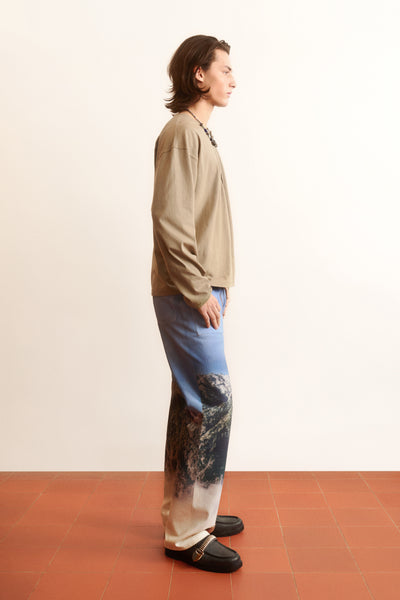 Men’s blue printed denim jeans with mountain and nature graphic, straight-leg fit