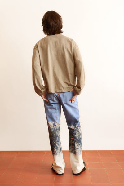 Men’s blue printed denim jeans with mountain and nature graphic, straight-leg fit